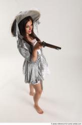 LUCI_AVIOL STANDING POSE WITH TWO GUNS